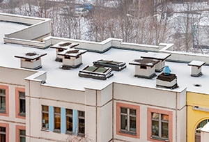 Commercial Flat Roof Snow Removal Guide
